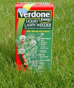 Weedkiller pack on lawn