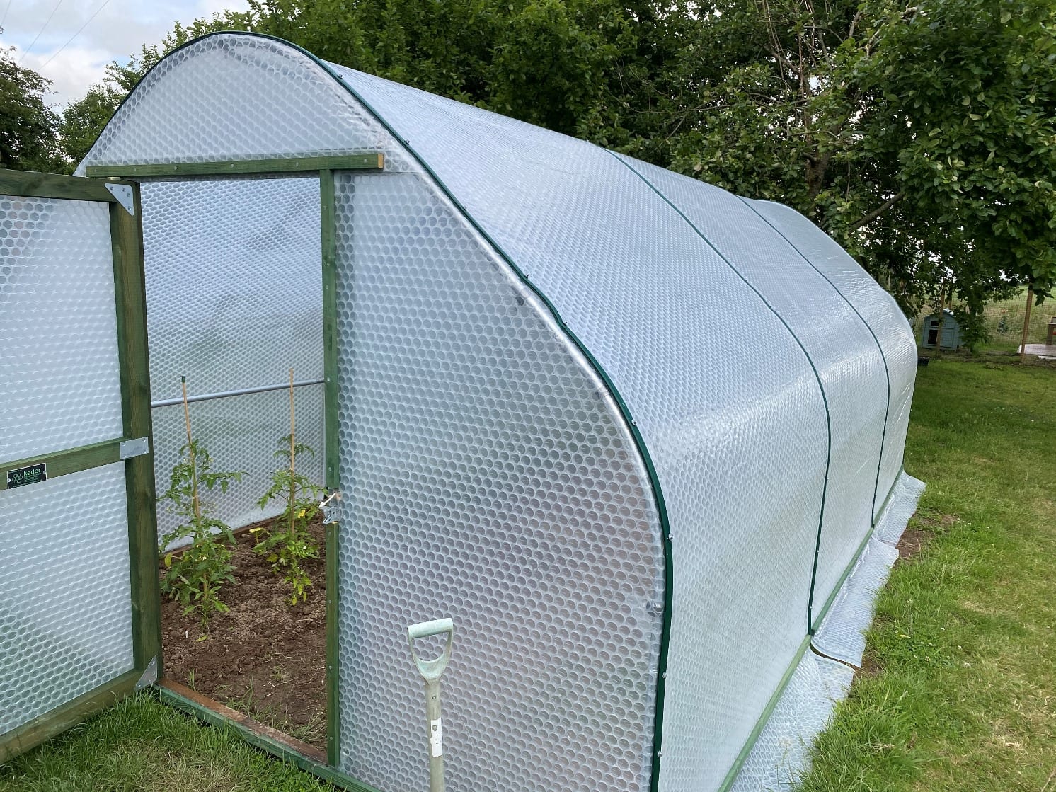 Erecting a Keder Greenhouse - Down to Earth
